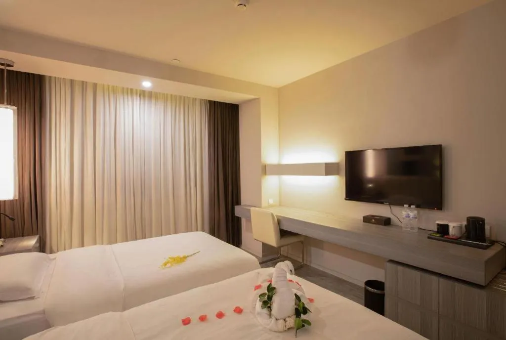 Bed in Jinjiang Metropolo Hotel - Qingdao Chengyang District Government