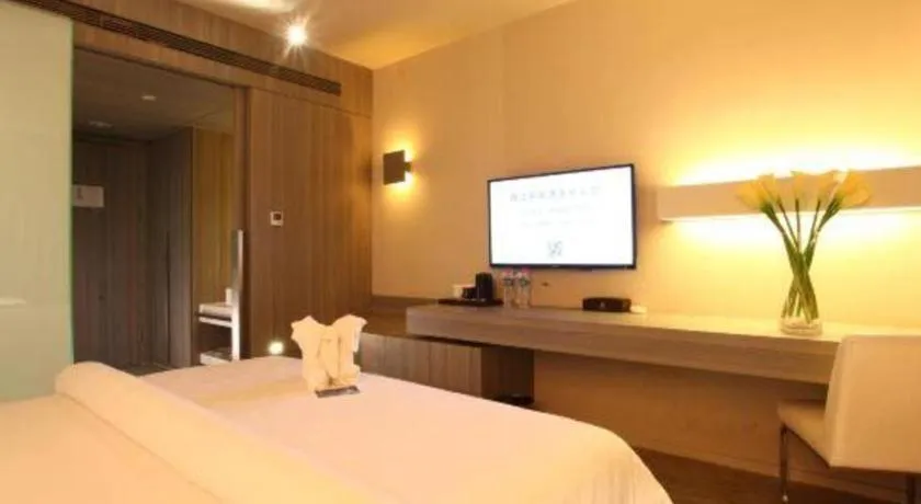 Bed in Jinjiang Metropolo Hotel - Qingdao Chengyang District Government