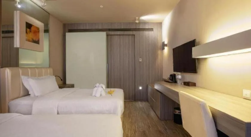 Bed in Jinjiang Metropolo Hotel - Qingdao Chengyang District Government