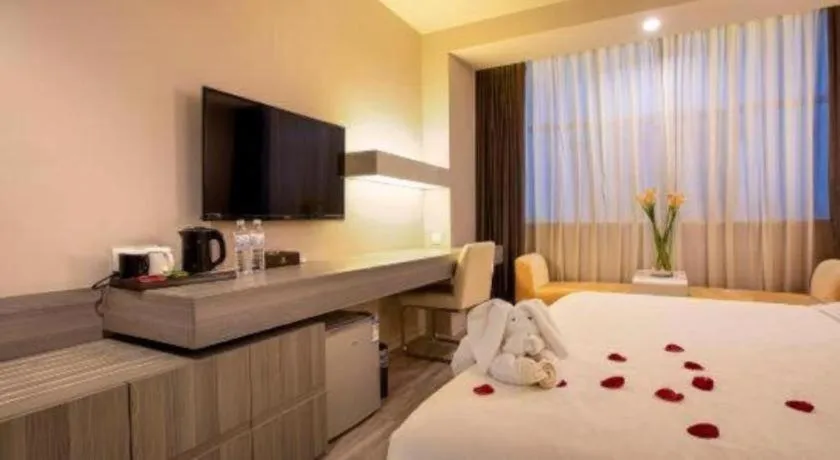 Bed in Jinjiang Metropolo Hotel - Qingdao Chengyang District Government