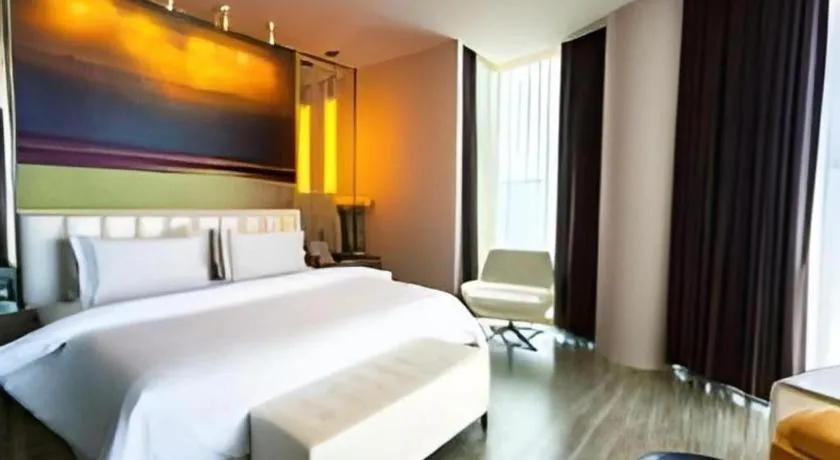 Bed in Jinjiang Metropolo Hotel - Qingdao Chengyang District Government