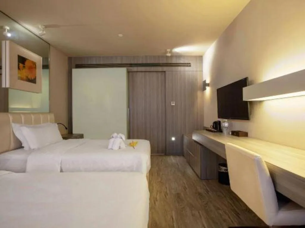 Bed in Jinjiang Metropolo Hotel - Qingdao Chengyang District Government