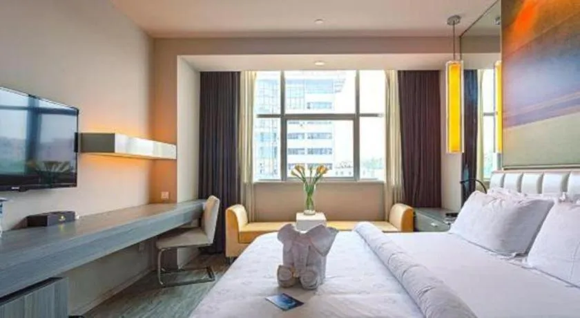 Bed in Jinjiang Metropolo Hotel - Qingdao Chengyang District Government