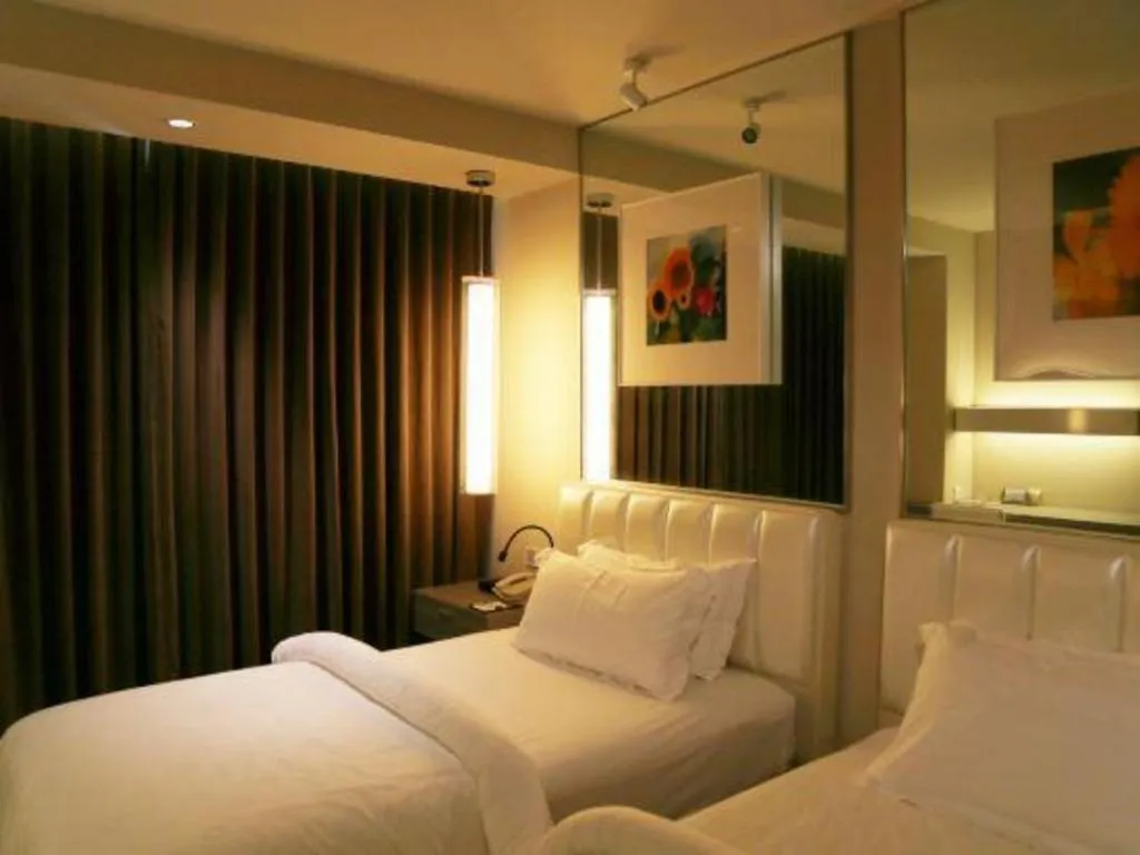 Bed in Jinjiang Metropolo Hotel - Qingdao Chengyang District Government