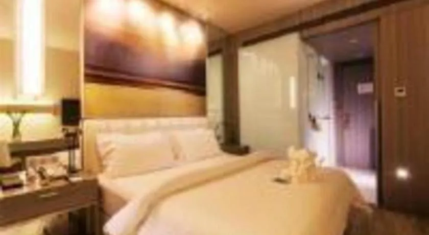 Bed in Jinjiang Metropolo Hotel - Qingdao Chengyang District Government