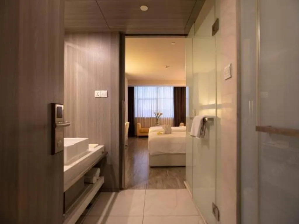 Bed in Jinjiang Metropolo Hotel - Qingdao Chengyang District Government