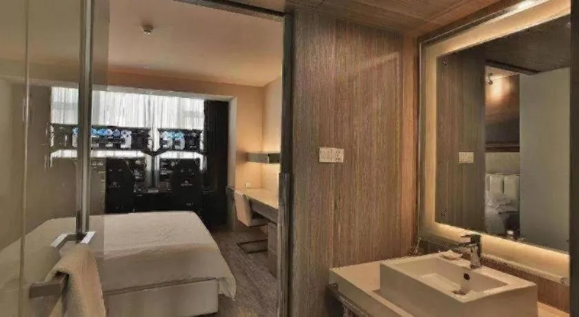 Bed in Jinjiang Metropolo Hotel - Qingdao Chengyang District Government