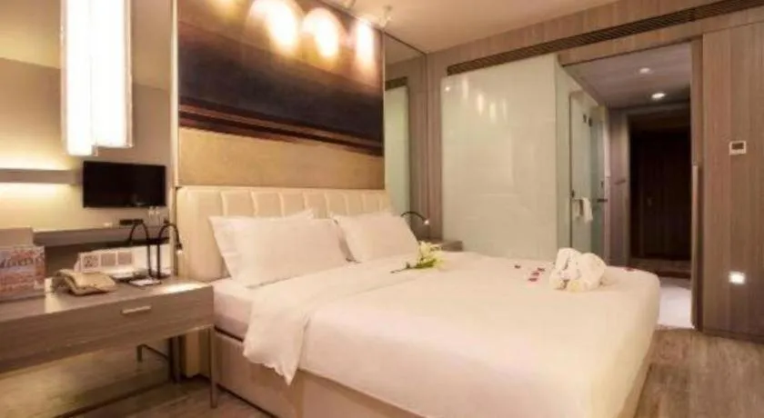 Bed in Jinjiang Metropolo Hotel - Qingdao Chengyang District Government