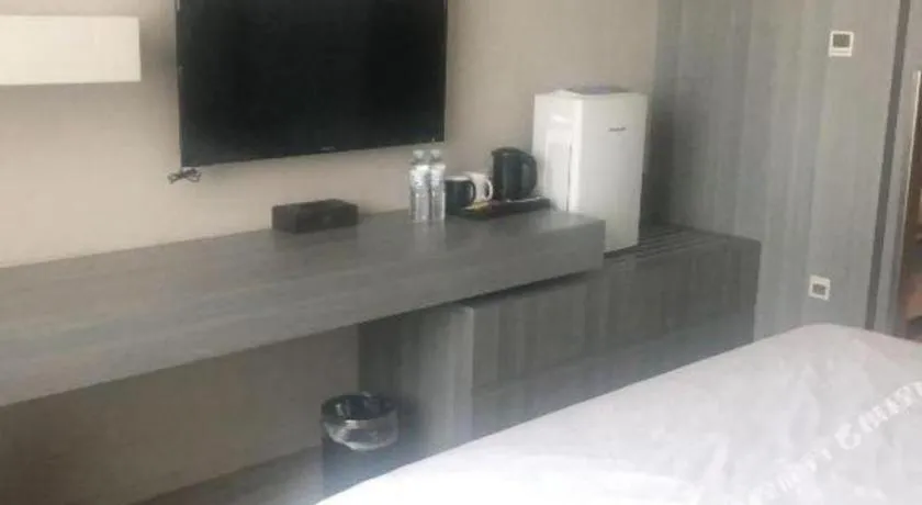 Bed in Jinjiang Metropolo Hotel - Qingdao Chengyang District Government