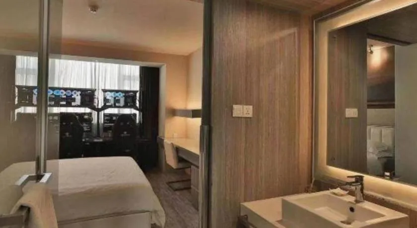 Bed in Jinjiang Metropolo Hotel - Qingdao Chengyang District Government