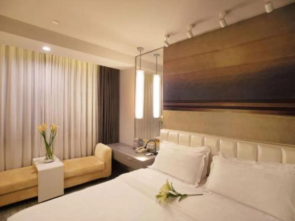 Bed in Jinjiang Metropolo Hotel - Qingdao Chengyang District Government