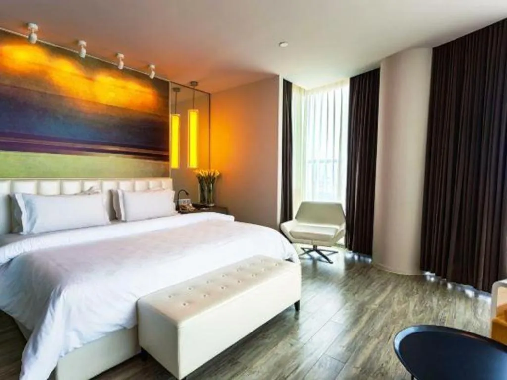 Bed in Jinjiang Metropolo Hotel - Qingdao Chengyang District Government