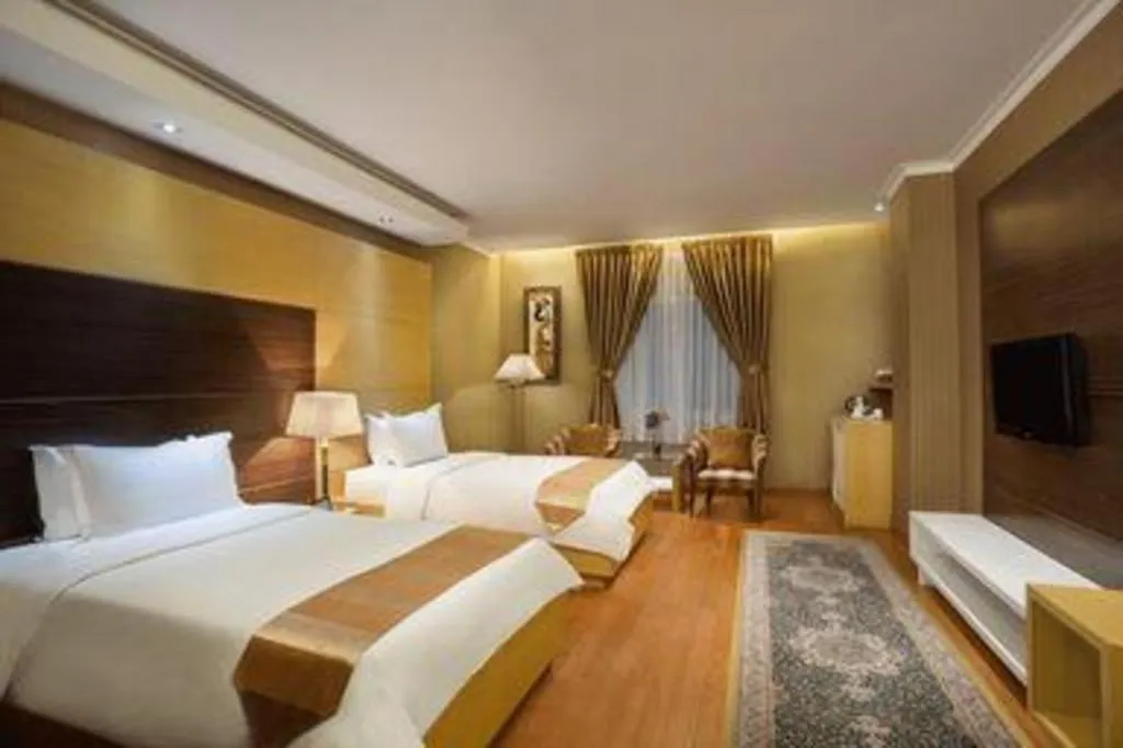 Bed in Sahati Hotel
