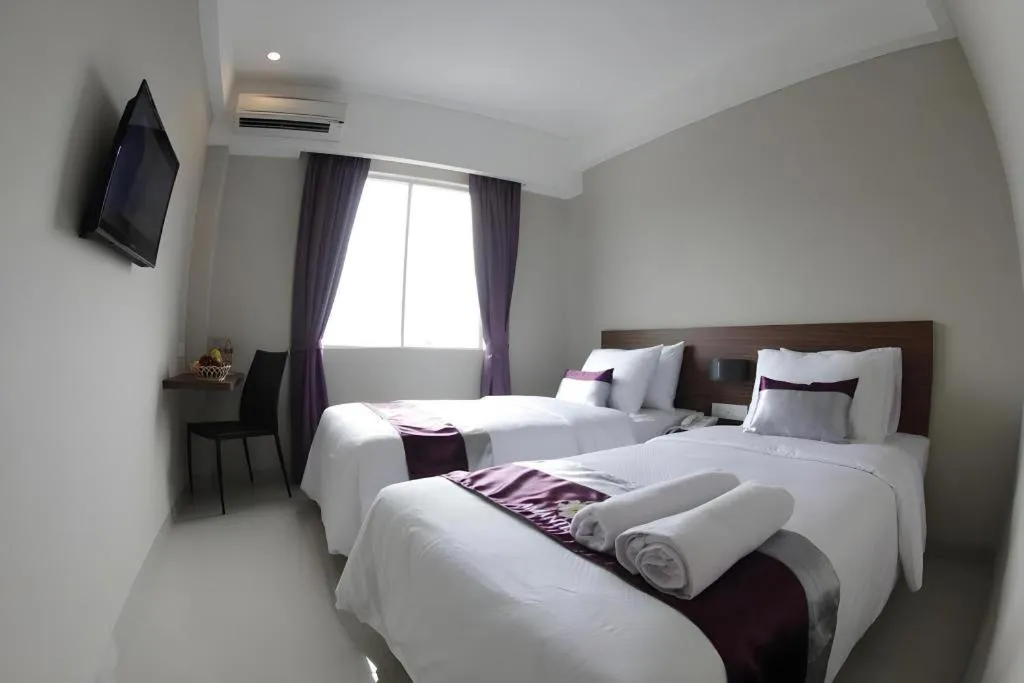 Bed in Amantis Hotel