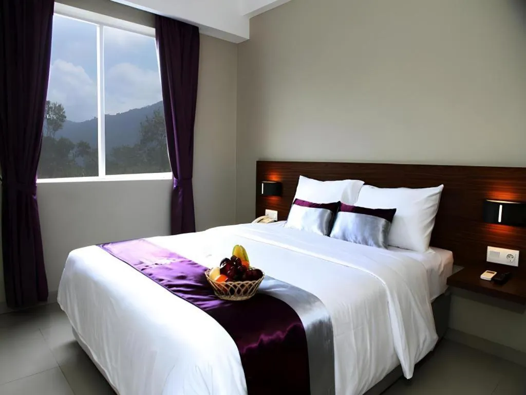 Bed in Amantis Hotel