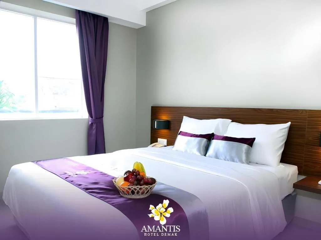 Bed in Amantis Hotel