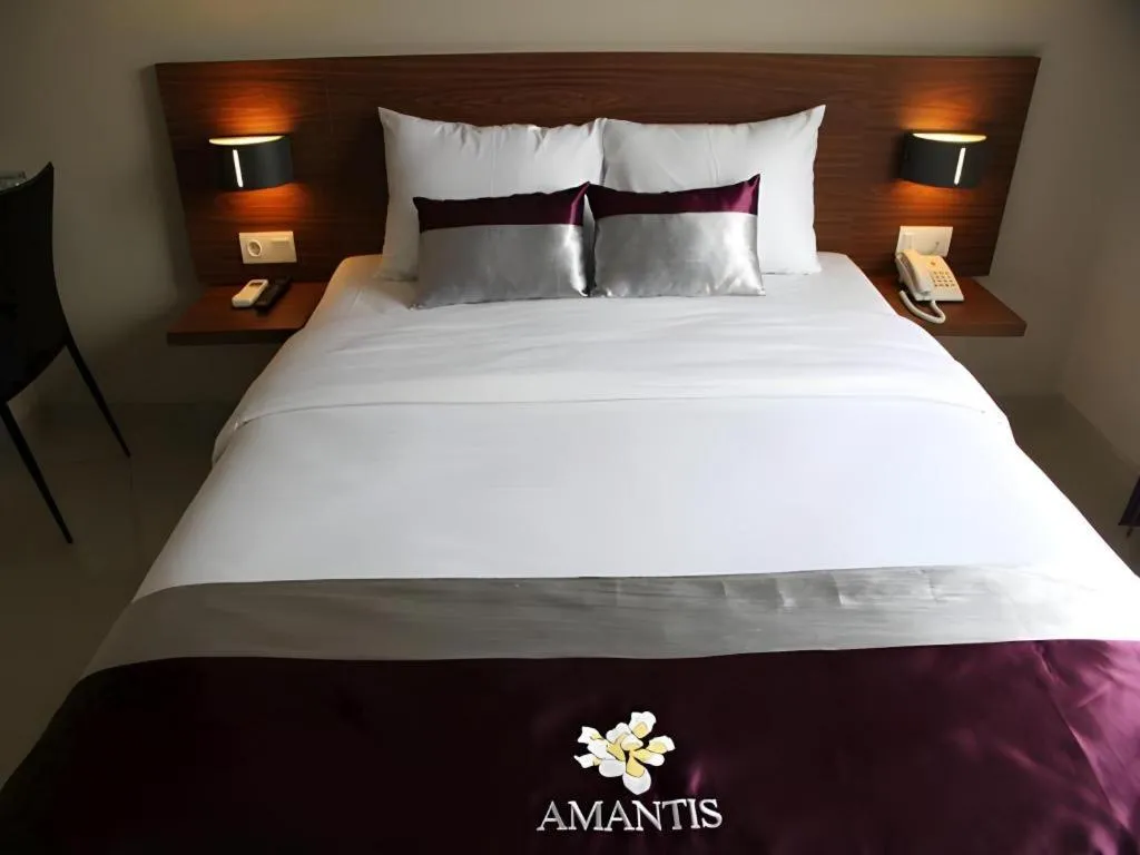 Bed in Amantis Hotel