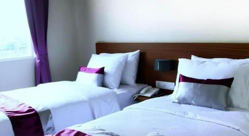 Bed in Amantis Hotel