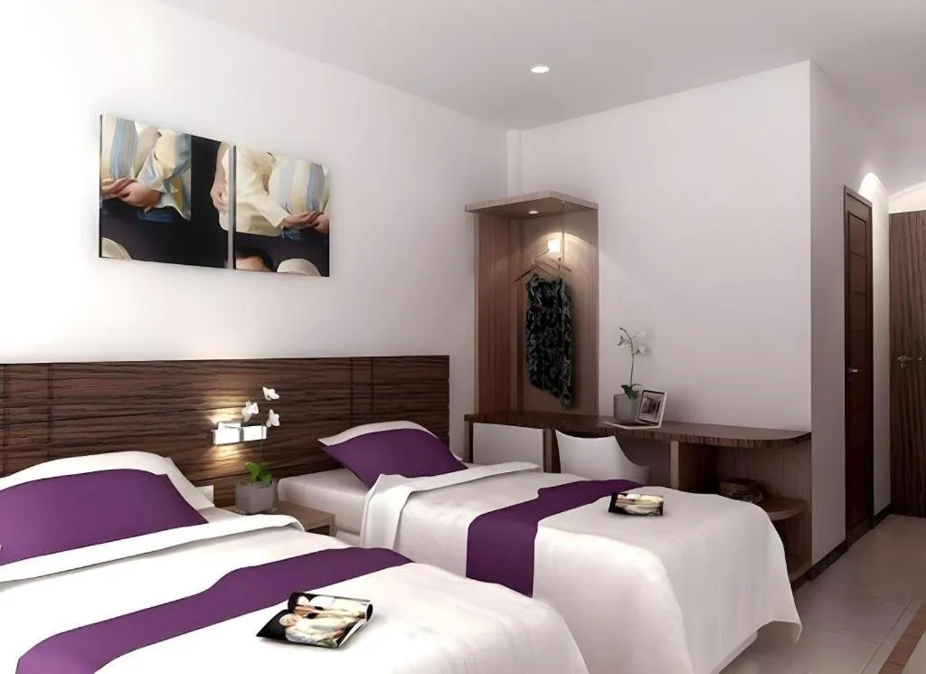 Bed in Amantis Hotel