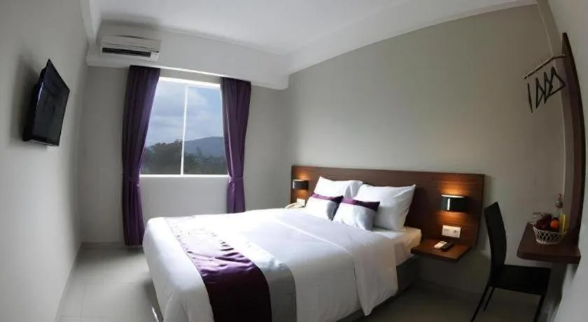 Bed in Amantis Hotel