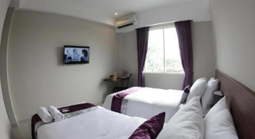 Bed in Amantis Hotel