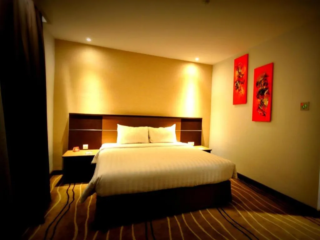 Bed in D Maleo Hotel Makassar