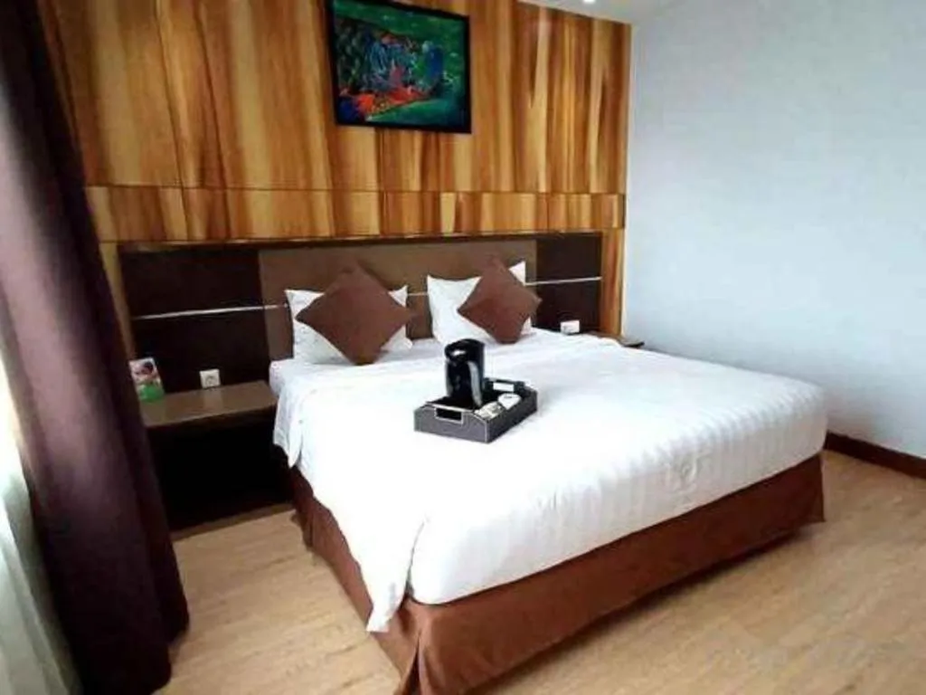 Bed in D Maleo Hotel Makassar