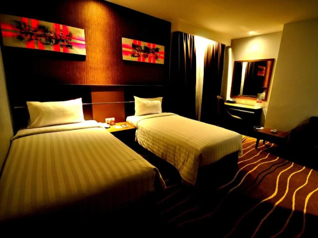Bed in D Maleo Hotel Makassar