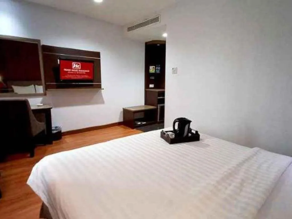 Bed in D Maleo Hotel Makassar
