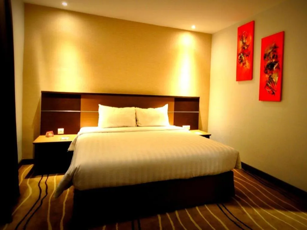 Bed in D Maleo Hotel Makassar