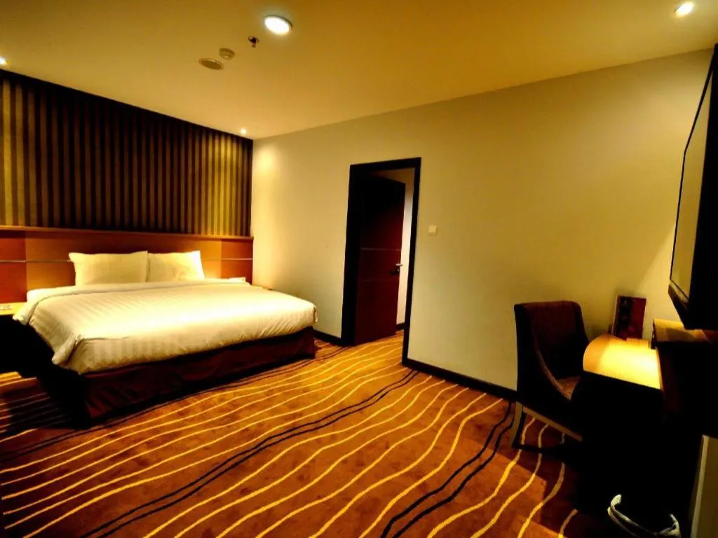 Bed in D Maleo Hotel Makassar
