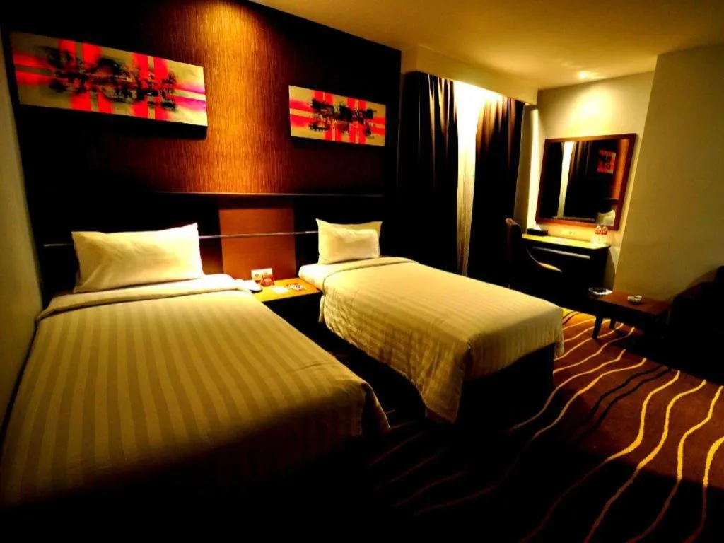 Bed in D Maleo Hotel Makassar