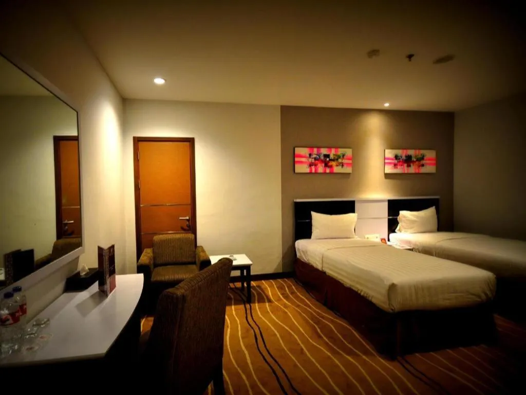 Bed in D Maleo Hotel Makassar