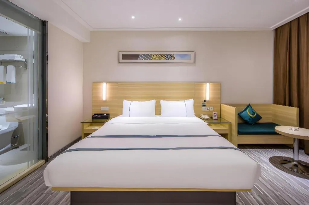 Bed in City Comfort Inn Guangzhou Baiyun Mountain
