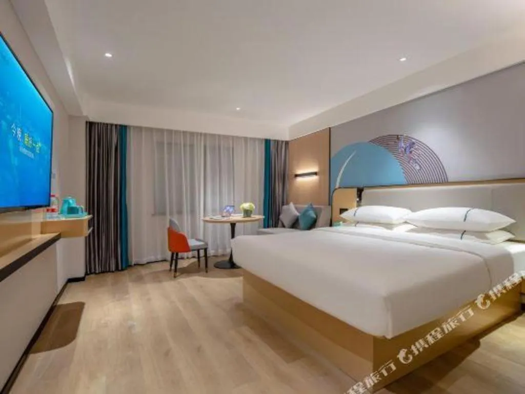 Bed in City Comfort Inn Guangzhou Baiyun Mountain