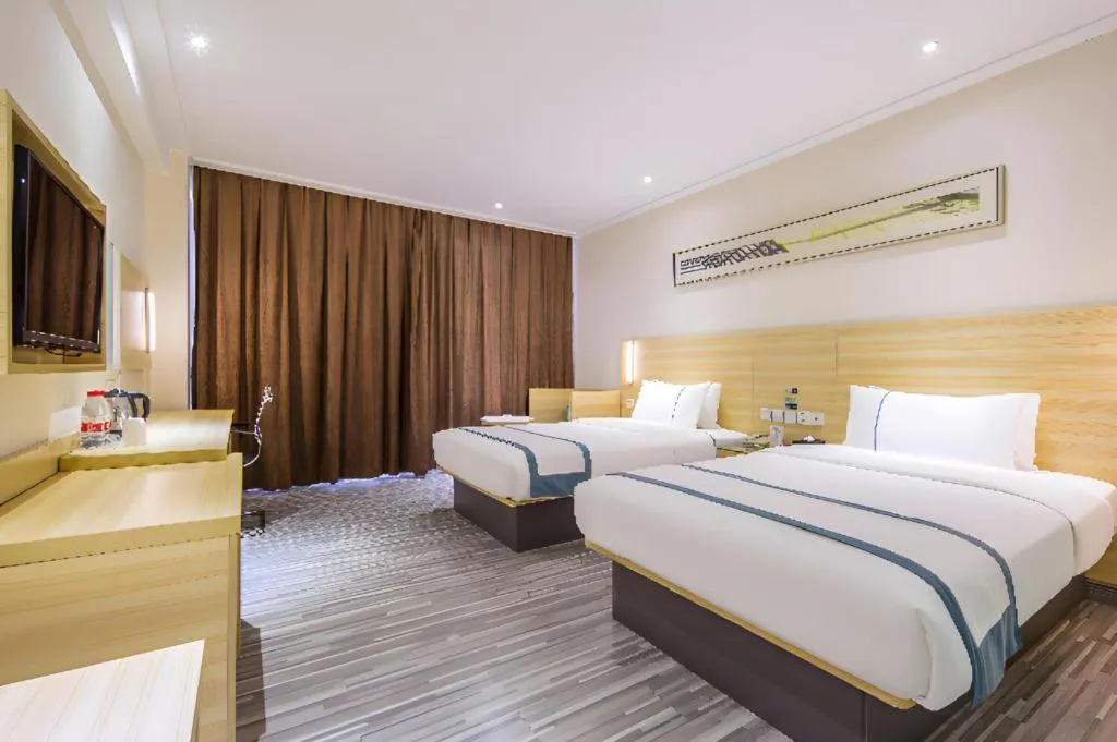 Bed in City Comfort Inn Guangzhou Baiyun Mountain