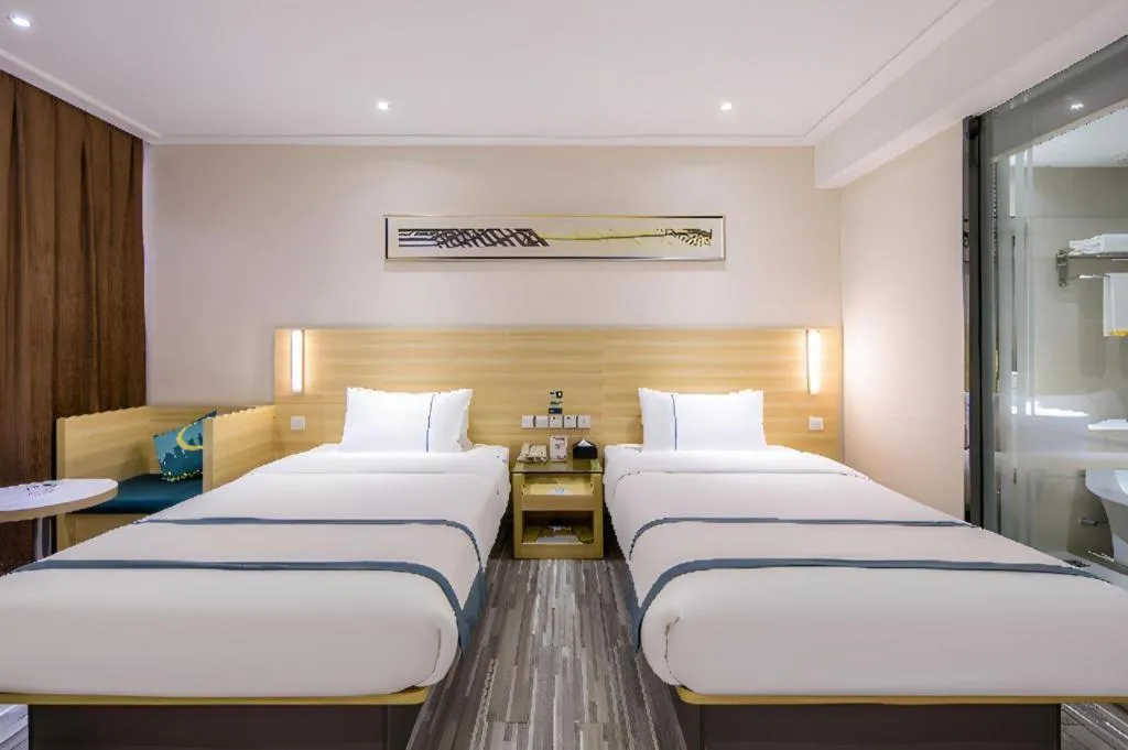 Bed in City Comfort Inn Guangzhou Baiyun Mountain