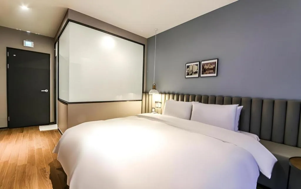 Bed in Gimhae Perfect Hotel