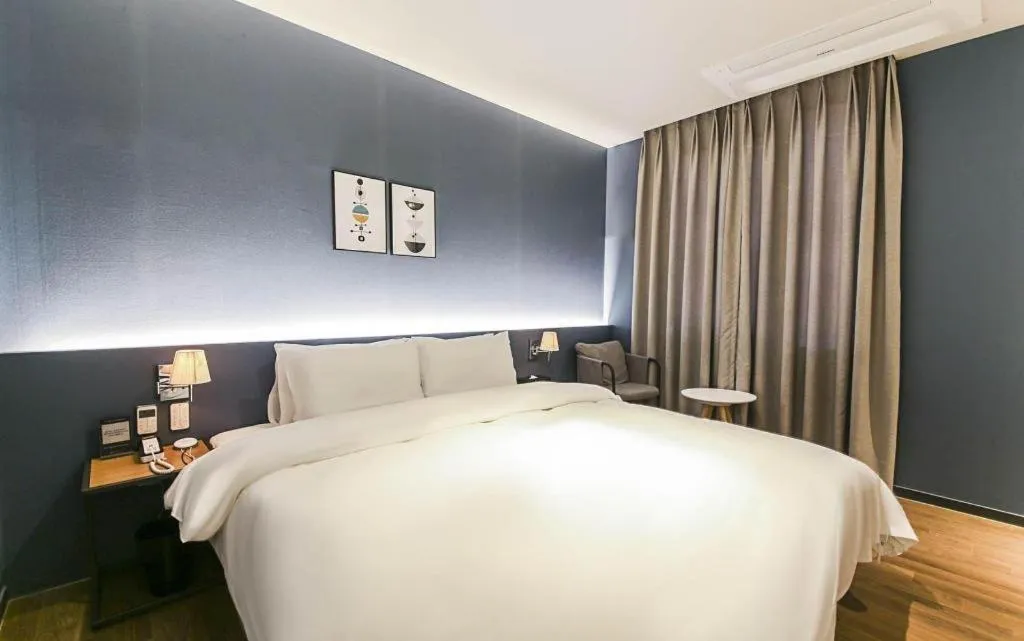 Bed in Gimhae Perfect Hotel