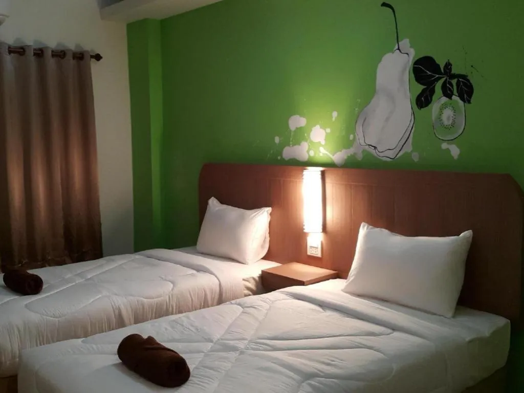 Bed in Silayok Grand Hotel