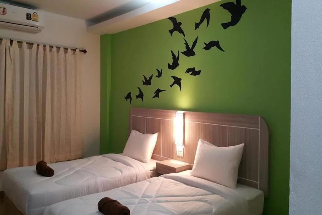 Bed in Silayok Grand Hotel