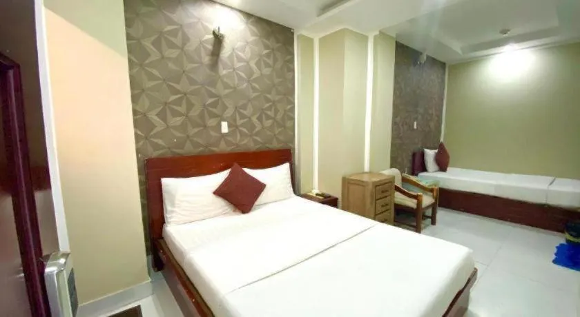 Bed in Mi Linh Hotel