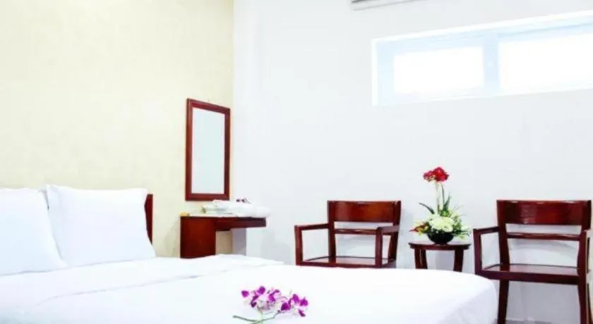 Bed in Mi Linh Hotel