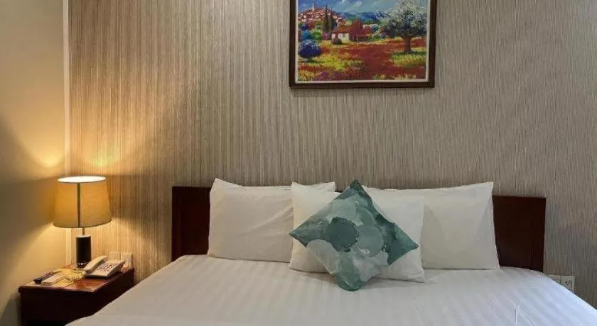 Bed in Mi Linh Hotel