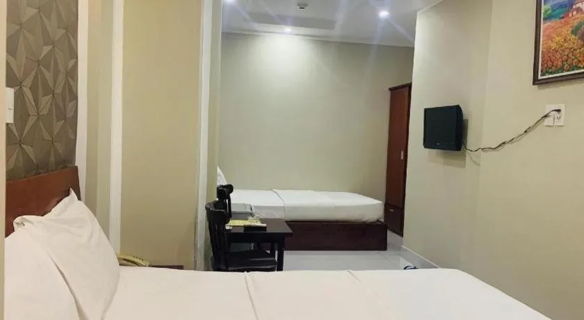 Bed in Mi Linh Hotel