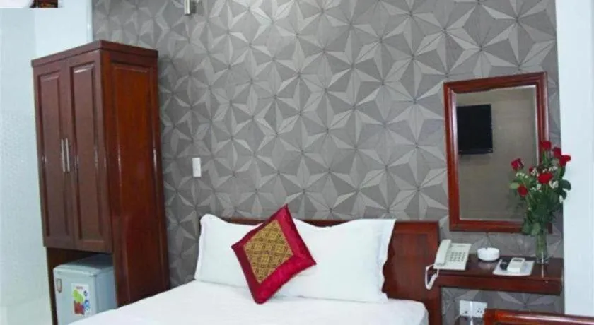 Bed in Mi Linh Hotel