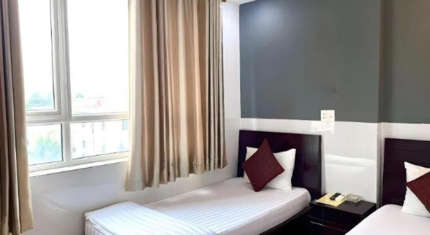 Bed in Mi Linh Hotel