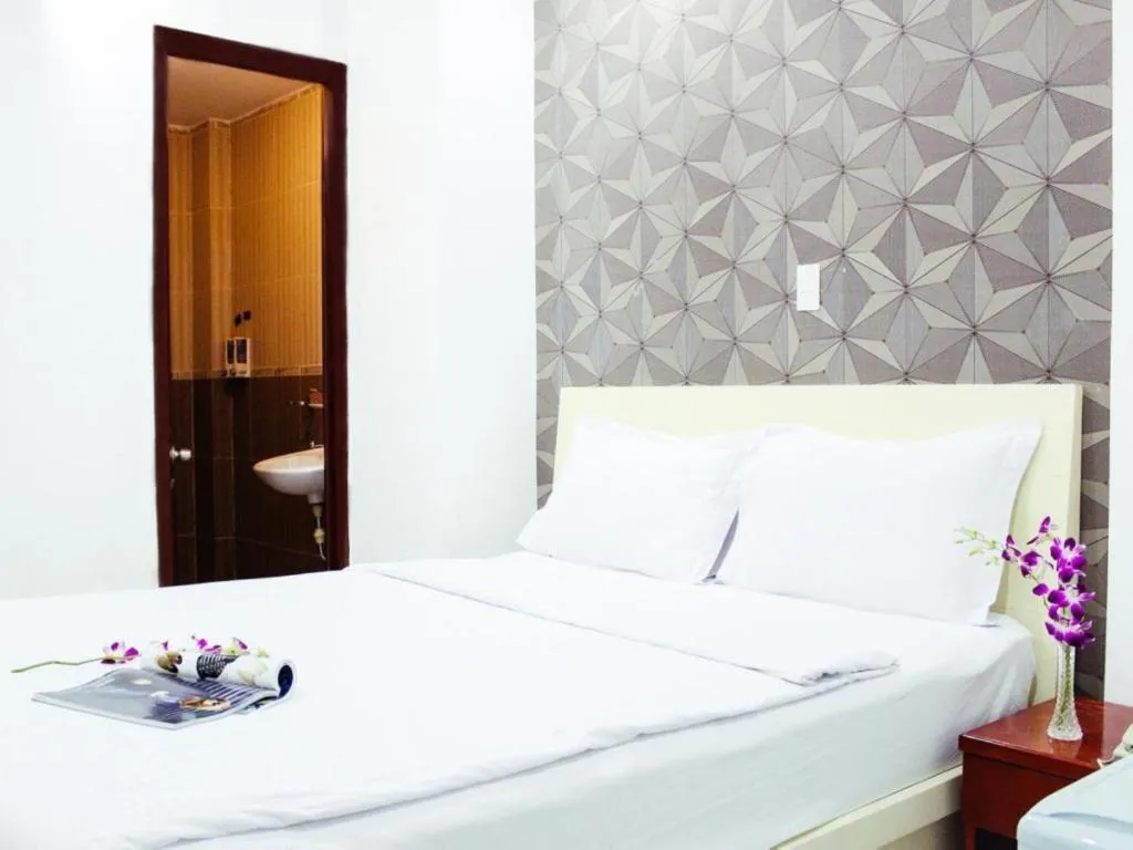 Bed in Mi Linh Hotel