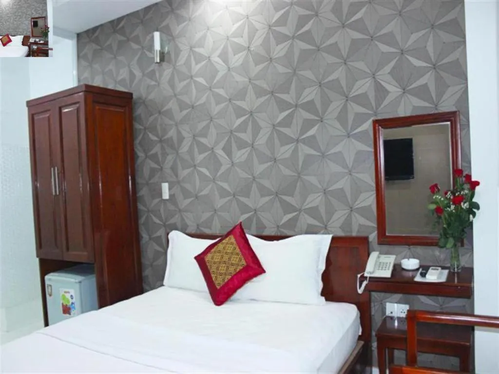 Bed in Mi Linh Hotel