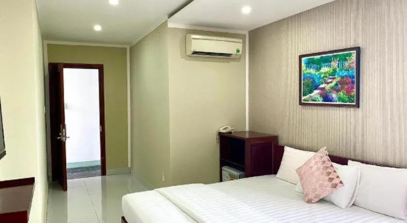 Bed in Mi Linh Hotel